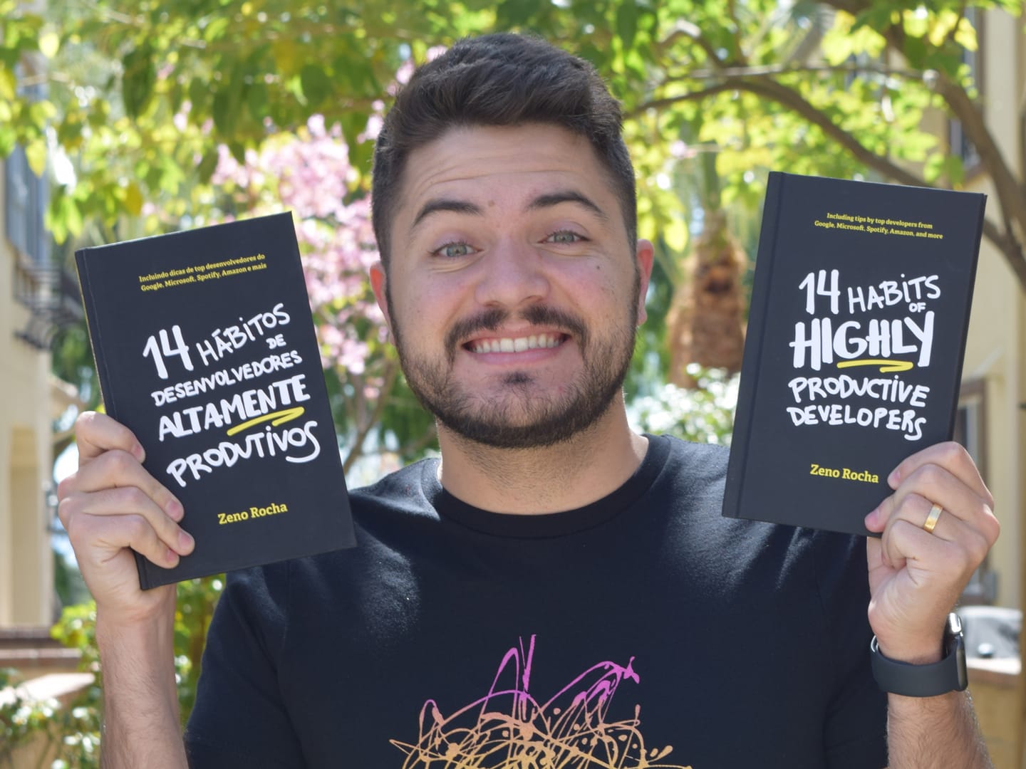 Zeno holding the physical book